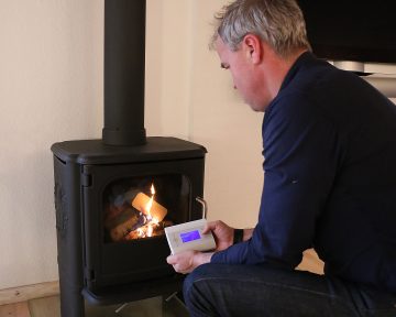 Rekindling the Fireplace Without Living Room Smoke Particles